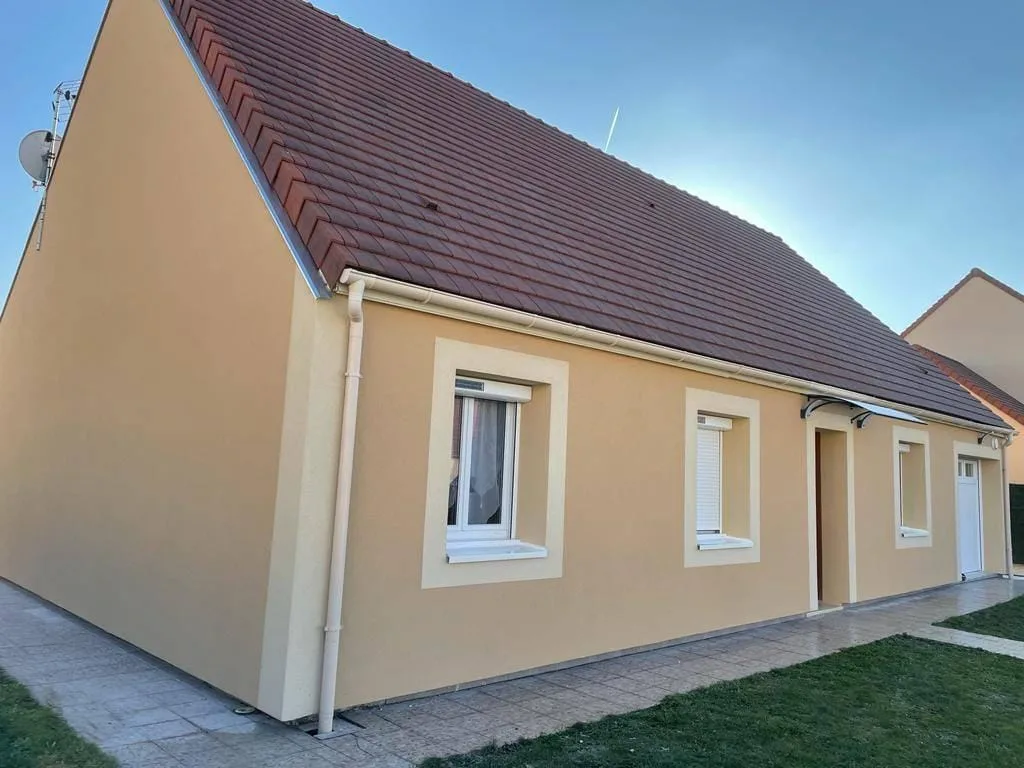 Maison rénovée, tuiles et façade